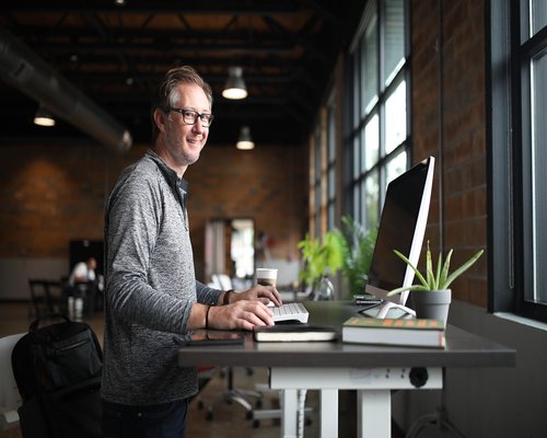A modern bright office space with plants